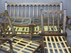 ERCOL THREE PIECE SUITE plus two foot stools, Gothic style (the upholstered cushions are available