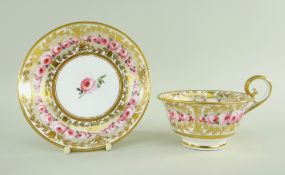 A NANTGARW PORCELAIN BREAKFAST CUP & SAUCER having flared shallow body and inverted heart shaped