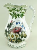 AN YNYSMEUDWY WATER JUG IN A FLORAL TRANSFER PATTERN of bellied form over a spreading foot, with