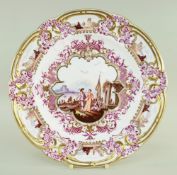 A FINE & VERY RARE NANTGARW PORCELAIN PLATE IN THE MEISSEN STYLE lavishly decorated in puce