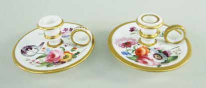 A RARE PAIR OF NANTGARW PORCELAIN CANDLESTICKS having ring handles, campana shaped nozzles to