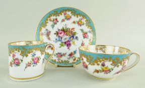 A NANTGARW PORCELAIN TRIO comprising breakfast cup, coffee can and saucer, decorated in the early-