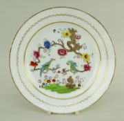 A SWANSEA PORCELAIN PLATE WITH 'PARAKEETS IN A TREE' PATTERN with both birds chained to a gnarled