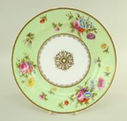 A SWANSEA PORCELAIN PLATE WITH LIME GREEN RESERVE BORDER painted with sprays of flowers and