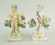 A RARE PAIR OF SWANSEA CAMBRIAN POTTERY PUTTI in the form of swag wearing flower pickers and their