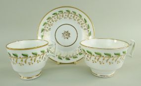 A SWANSEA PORCELAIN TRIO the cups with curvaceous ogee handles and decorated with Pattern No. 251