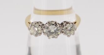 18CT GOLD THREE STONE DIAMOND RING, the three claw set stones totalling 1.0cts approximately (visual