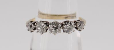 18CT GOLD FIVE STONE DIAMOND RING the five claw set stones totalling 0.75cts approximately (visual