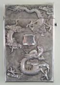 CHINESE SILVER CARD CASE, makers mark 'NM' c. 1900, embossed in high relief with a four-clawed
