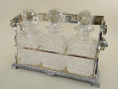 FINE GEORGE V SILVER TANTALUS, James Dixon & Sons, Sheffield 1928, with scrolled loop handle to