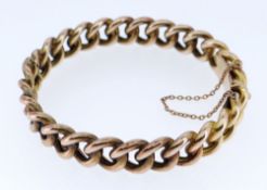15CT GOLD FIXED CURB LINK BRACELET WITH SAFETY CHAIN, 25.6gms, stamped '15' to the clasp, 6.75cms