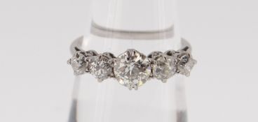 WHITE METAL FIVE STONE DIAMOND RING, the claw set graduating stones totalling 1.0cts
