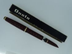VINTAGE ONOTO K4 SERIES FOUNTAIN PEN - (mid 1950s) Maroon De La Rue with piston filler system, a