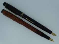 TWO VINTAGE (1930s-40s) 'THE DE LA RUE PEN' FOUNTAIN PENS -1.) Brown Woodgrain No.560 fountain pen