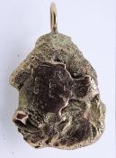 A ROUGH YELLOW METAL & GOLD NUGGET PENDANT, marks to the gold indistinct, 24.8grms