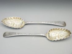 GEORGE IV BERRY SERVING SPOONS, a pair by William Bateman, London 1832, having ornated chased