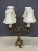 BRASS FOUR BRANCH CANDELABRA (converted), 52cms H with shades