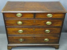 NEAT ANTIQUE MAHOGANY CHEST of two short over three long drawers, pine lined with cock beaded