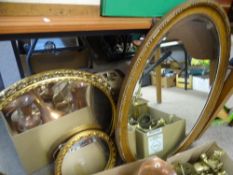TWO GILT FRAMED CIRCULAR & AN OAK EFFECT OVAL WALL MIRROR, various measurements