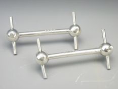 SPUTNIK END EDWARDIAN KNIFE RESTS, a pair, Birmingham 1906 in solid silver by G & J Bushell, 4