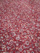 ENGLISH PATTERN STYLE WOOLLEN CARPET, red ground with extensive all over floral pattern repeated