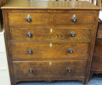 CIRCA 1840 ANGLESEY OAK CHEST of two short over three long drawers, pine lined with inlay detail and