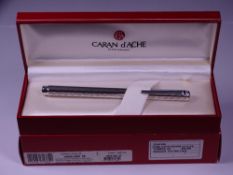 CARAN D'ACHE ECRIDOR FOUNTAIN PEN - Rhodium plated with 'Chevron' engraved barrel and cap. Rhodium