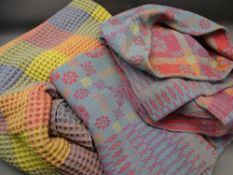 TWO WELSH WOOLEN BLANKETS, one on pink and blue tonal grounds with traditional reversible pattern,