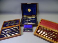 FOUR CASED DRAWING INSTRUMENT SETS including a Rosewood cased set with presentation plaque E W