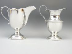 TWO BIRMINGHAM SILVER CREAM JUGS, makers S Blanckensee & Son to include a ewer form on circular foot