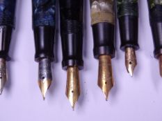 UNIQUE PENS (13) - The Unique Pen fountain pens, 10 with Warranted 14ct gold nibs, from one of the