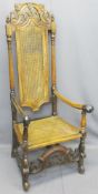 CHARLES II STYLE WALNUT HIGHBACK HALL CHAIR with carved crest rail above a cane back and seat with