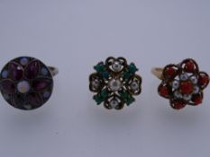 THREE DRESS RINGS - 1.a nine carat gold with floral seven coral and six pearl setting, 4.5 grms,