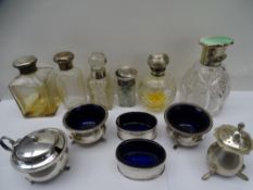 SILVER TOPPED SCENT BOTTLES & CONDIMENT ITEMS, a mixed quantity (various conditions)