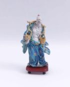 Chinese man as water carrier /