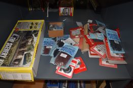 A shelf of Slater's and C&L Finescale accessories along with a Woodland Scenics Kit, all boxed or in