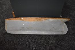 A large hand made painted wooden hull, length 86 inches