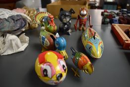 Six 1950's and later tin plate and clockwork toys, Great Britain, Germany and Japan, Triang, Duck