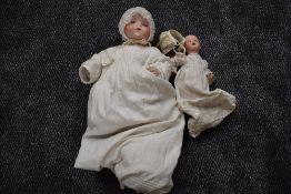 An early 20th century Heubach Koppelsdorf bisque headed doll having sleep eyes, open mouth with