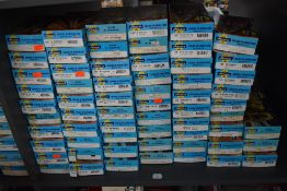 A shelf of Athearn HO scale rolling stock, Tankers, Hoppers, Cabooses etc, 62 items, all boxed and