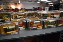 A collection of Sixty One Corgi Classics diecast Advertising Vehicles including Huntley & Palmer,