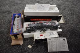 A Aristo Craft Trains Gauge 1 Triple Dome Tank Car, boxed along with two similar smaller wagons