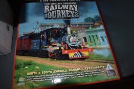 Two shelves of Railway related DVD's VHS and CD's