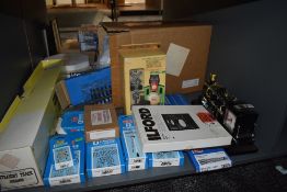 A shelf of 0 scale accessoies and track including Peco, Sevenscal etc