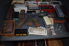 A shelf of 0 scale Slater's and similar items of rolling stock, some with boxes