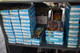 A shelf of Athearn HO scale rolling stock including three 40ft Container sets, a 50Ton Hopper 5