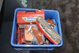 A selection of Lweis Galoob Toys Inc Micro Machine toys and accessories