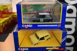 Nine Corgi (Swansea) diecast Mini's including C330/2 - C330/9 along with a later Corgi diecast Mini,
