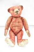 An original Steiff red mohair straw filled bear, possibly a smaller version of Alfonzo dating back