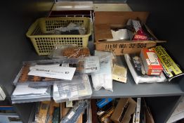 A shelf of 00/HO accessories including New Track, Springside, Hornby etc